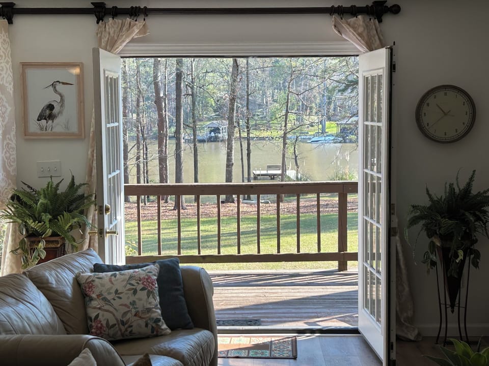 Double French doors leading to back deck