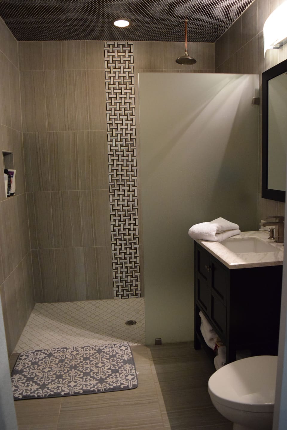 Linens and starter bathroom supplies provided.
