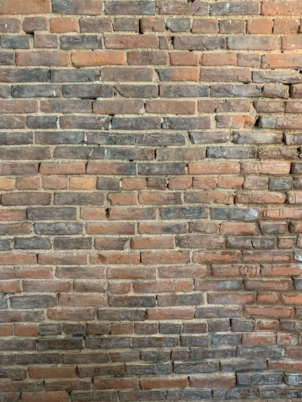Exposed brick over 100 years old