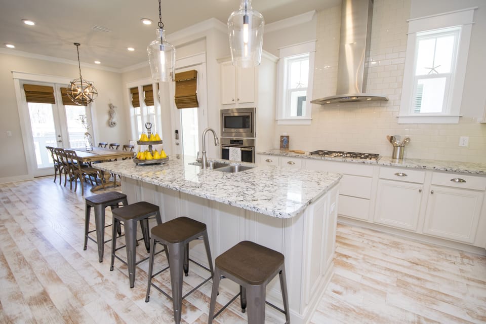 Fully stocked kitchen w/cookware, dishes, glasses, platters & utensils.  