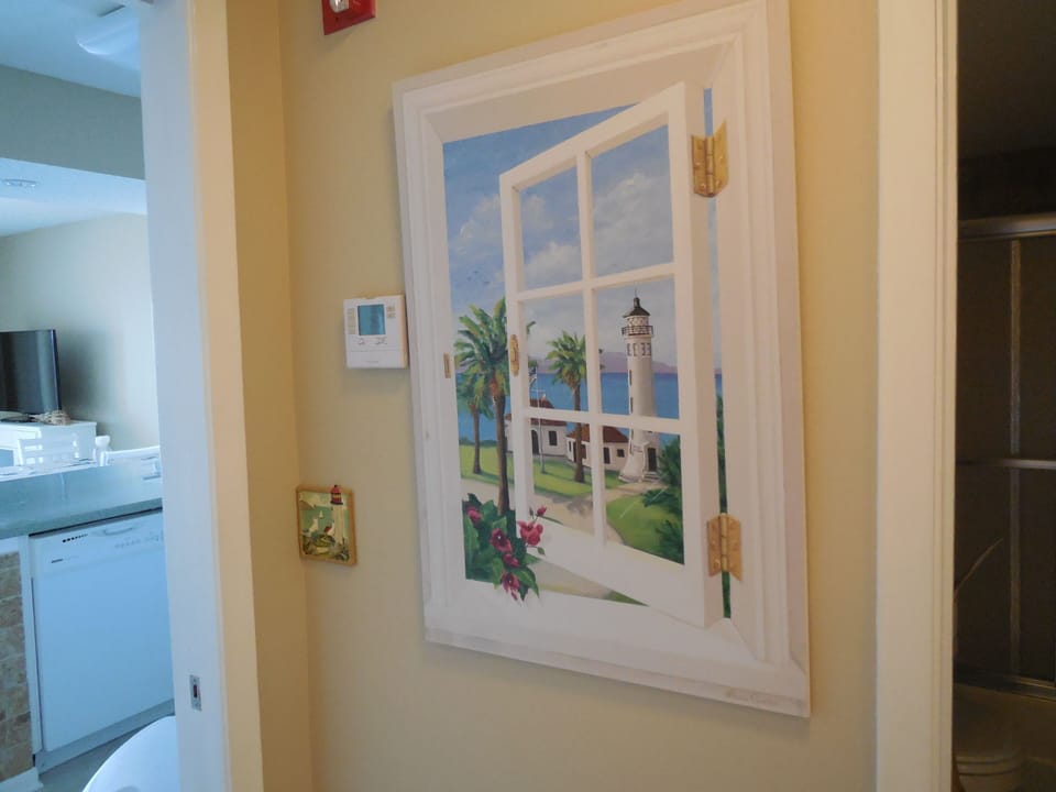The utility box is hidden behind picture