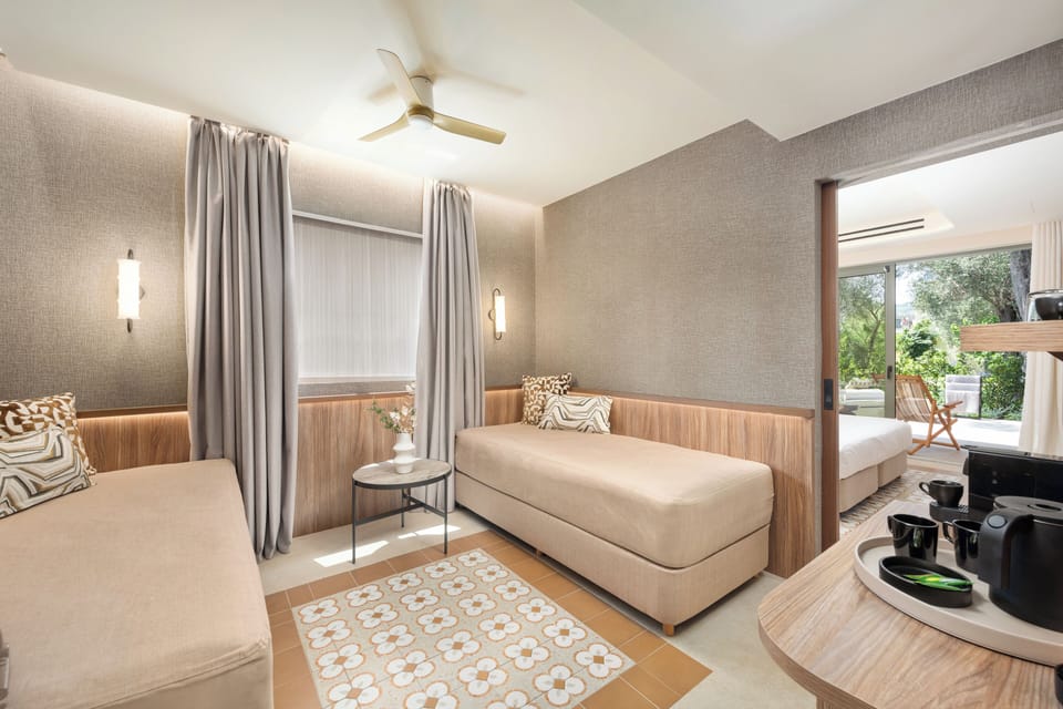 Deluxe Family Suite, Private Pool | Living area | 32-inch LED TV with satellite channels, TV