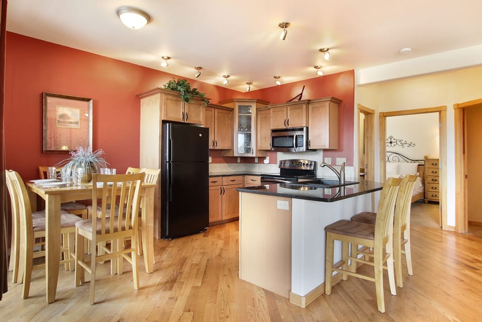 Condo, 2 Bedrooms | Private kitchen | Fridge, microwave, oven, dishwasher