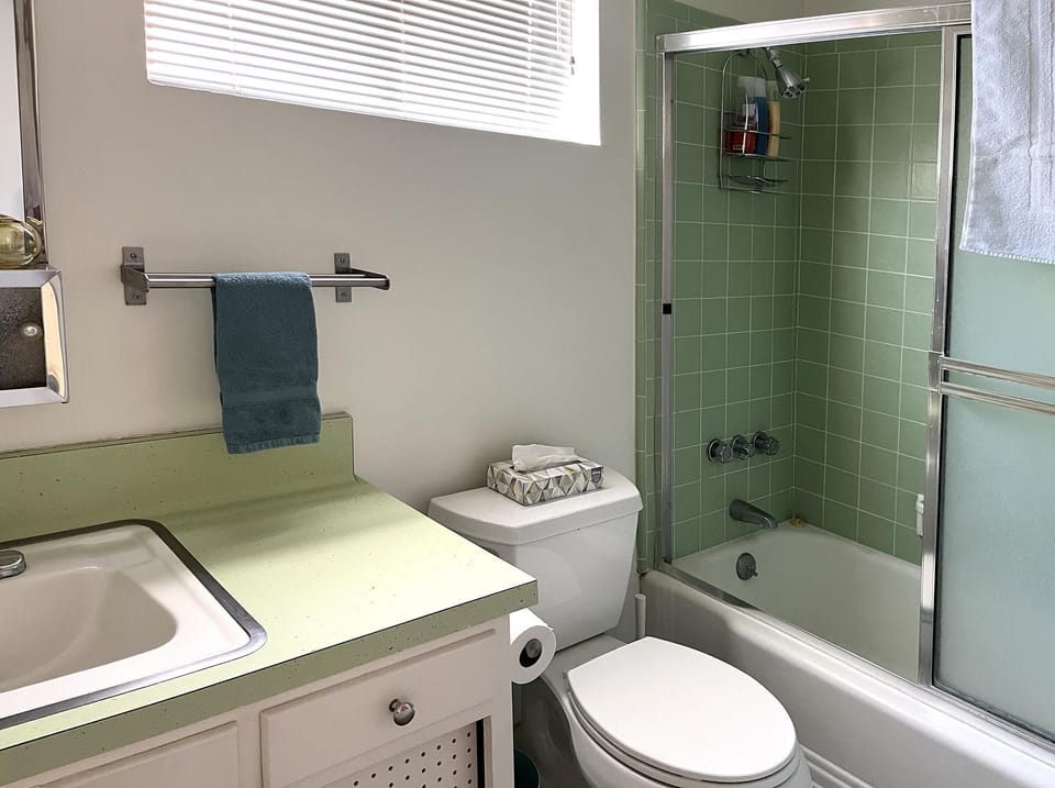 Bright and airy bathroom with vintage charm and natural light