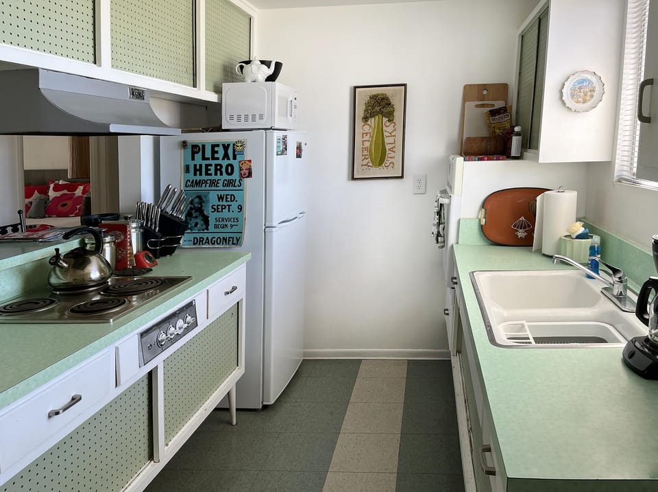 Bright retro kitchen with spacious counters and natural light