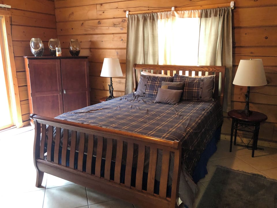 Master bedroom with sliding door to outside deck