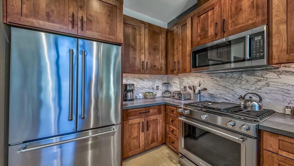 Condo, 2 Bedrooms | Private kitchen | Fridge, microwave, oven, dishwasher