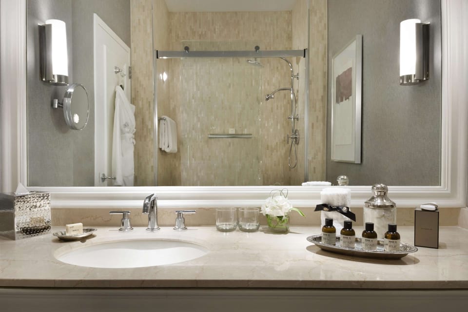 Combined shower/tub, designer toiletries, hair dryer, bathrobes