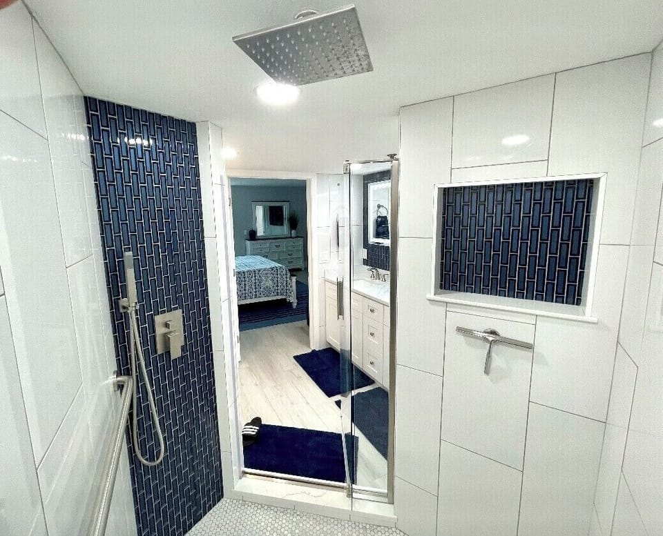 Beautiful light and bright shower In master bathroom.