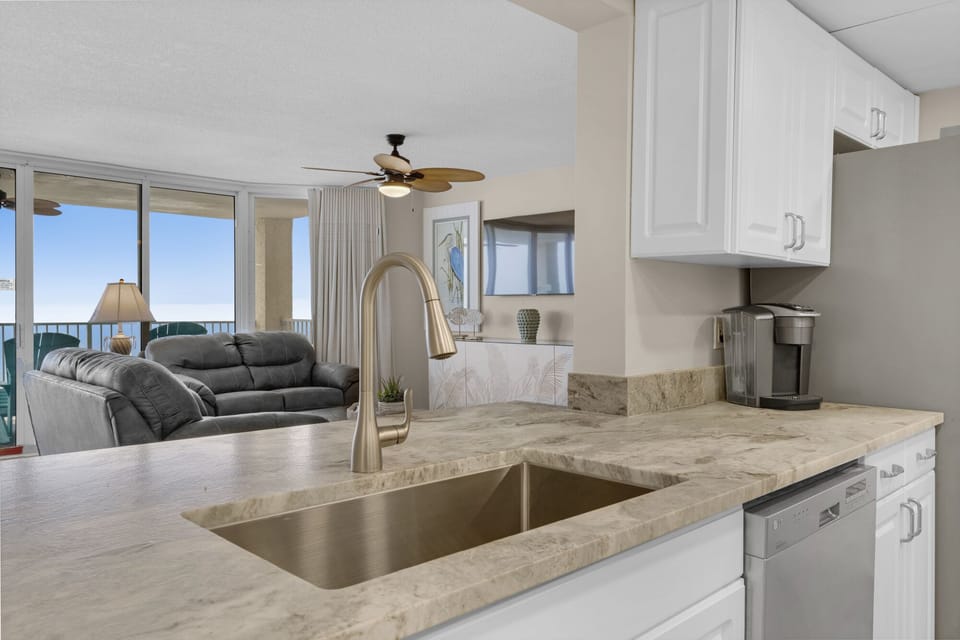 Kitchen is open to living and dining areas