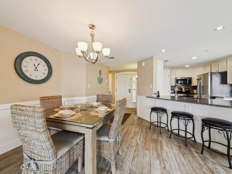 Dining Area and Kitchen with Breakfast Bar at 3210 Windsor Court South