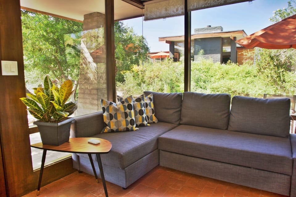 Sitting area to watch TV or relax. The sofa converts to a full size bed
