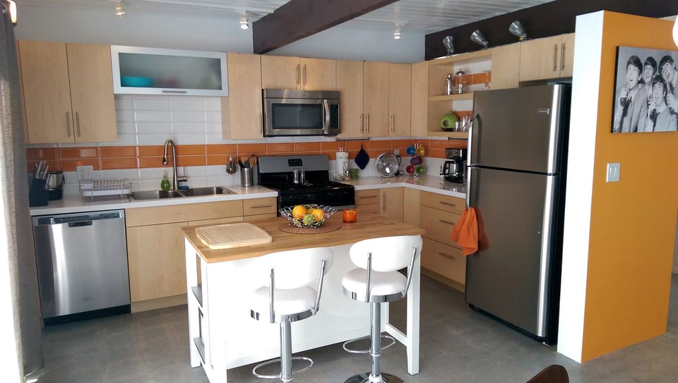 Kitchen and Island with Stools.