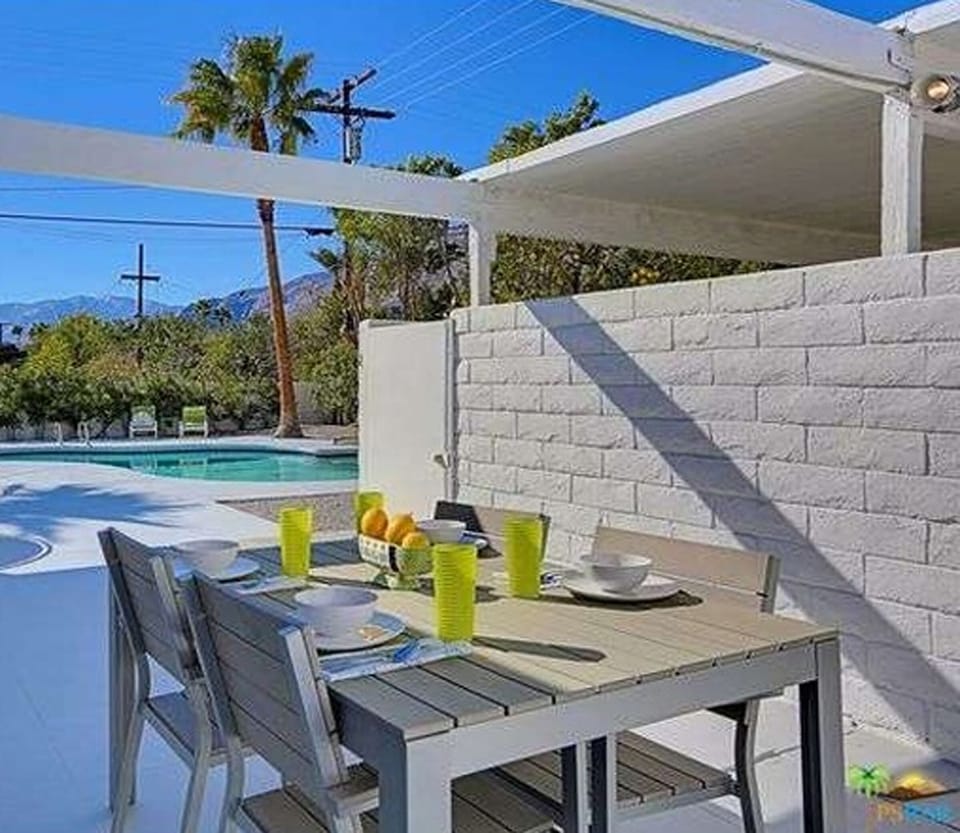 Outdoor dining table (seats 6 with bench).