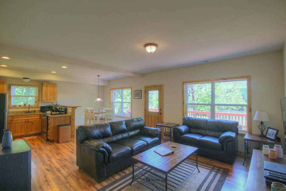 Open floor plan with kitchen area flowing into the living room