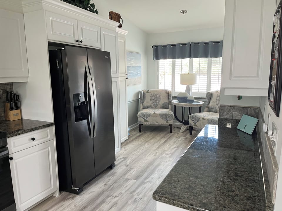 Large kitchen, refrigerator, stove, microwave,  dishwasher, granite countertops
