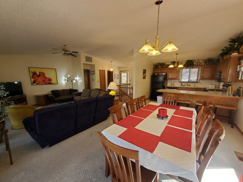 Dining Table Seats 8 plus 4 Stools at the Kitchen Counter.