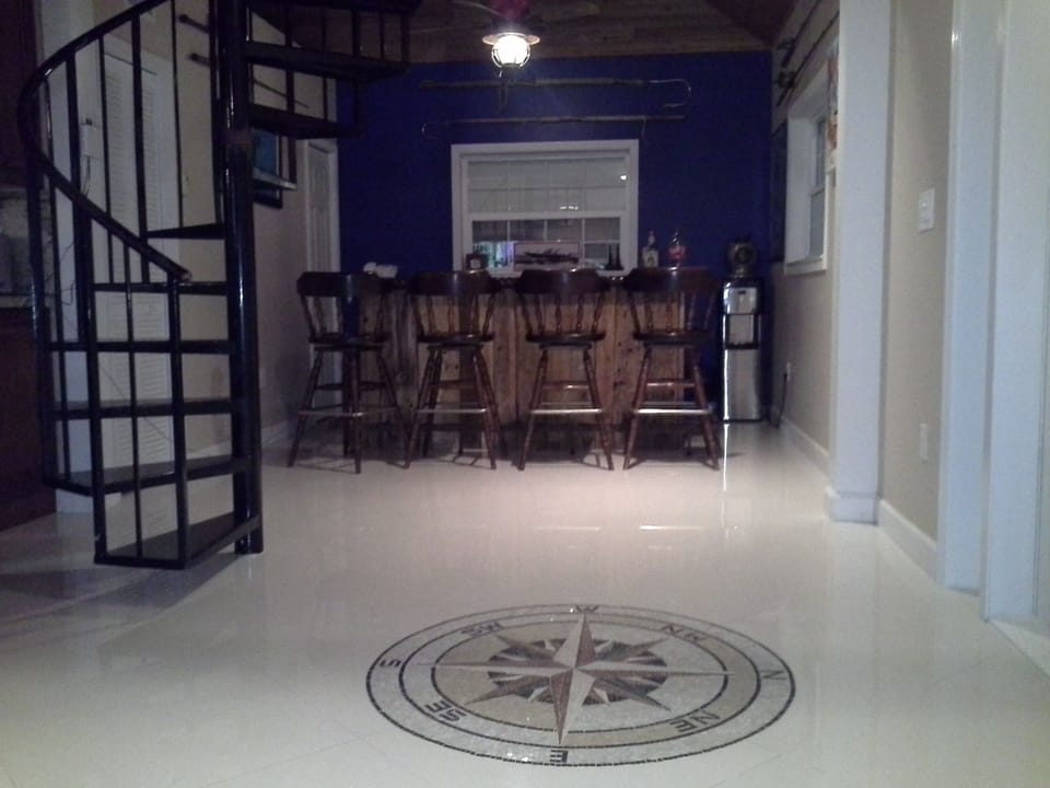 Custom bar with a canal view includes: blender, ice bucket, water cooler, telephone for free calls to USA and Canada and WiFi internet service.