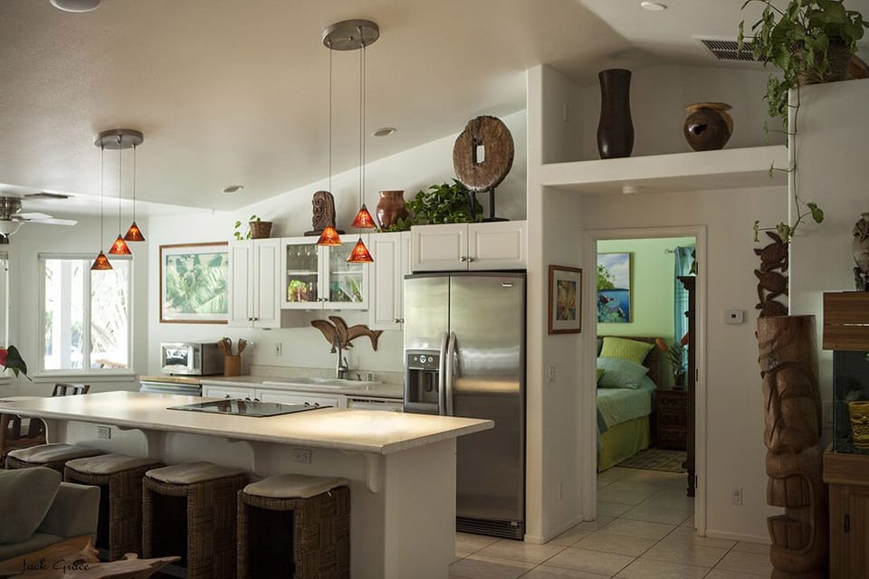 Kitchen shot, with view into master bedroom suite