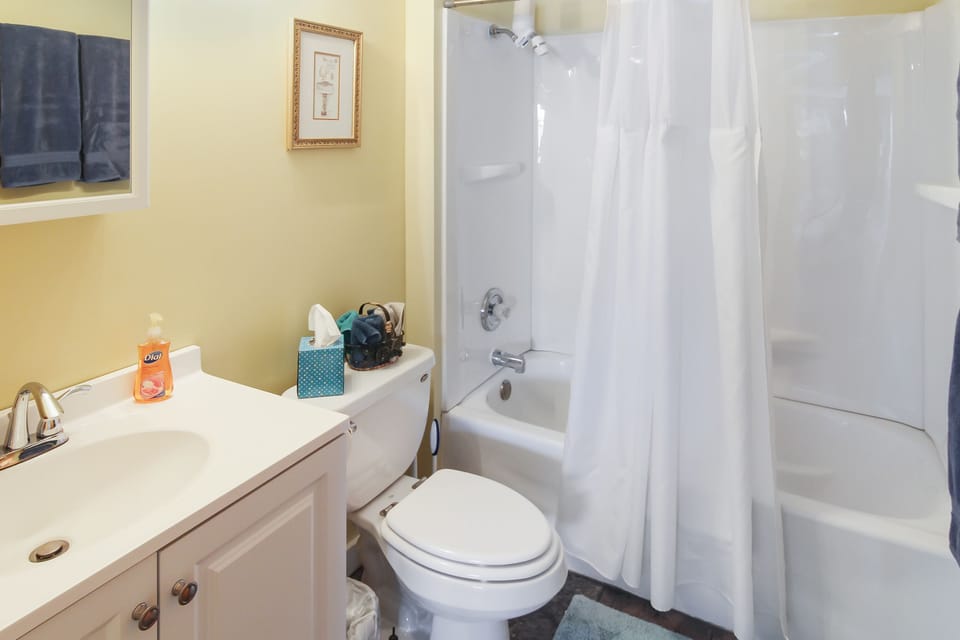 Upper bathroom with tub/shower combo