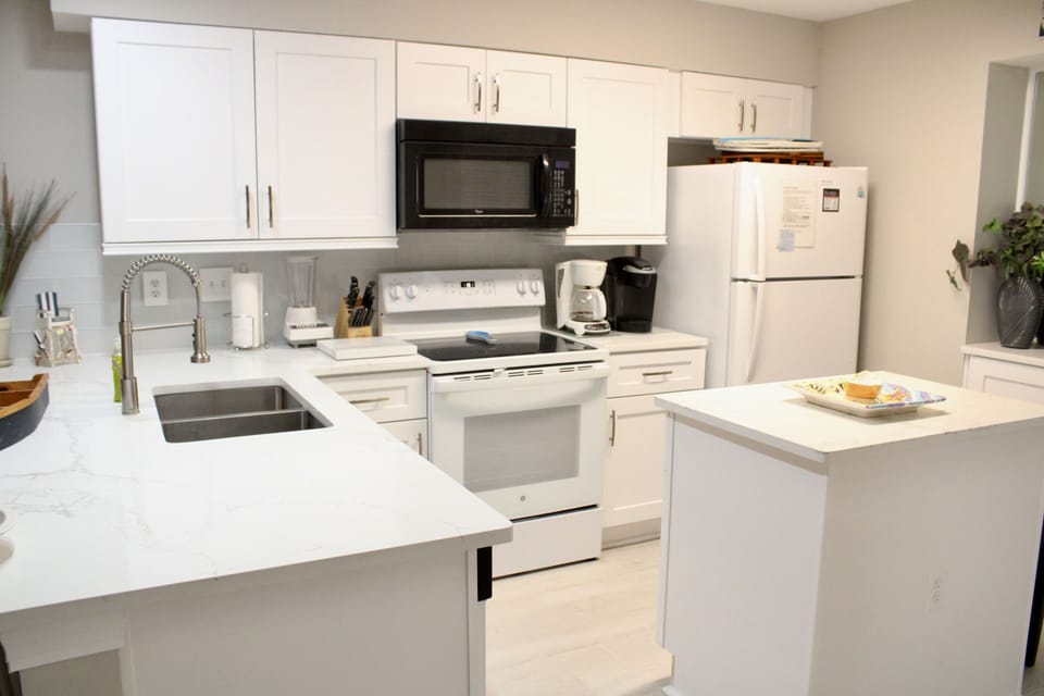 Beautiful fully renovated and fully stocked kitchen.