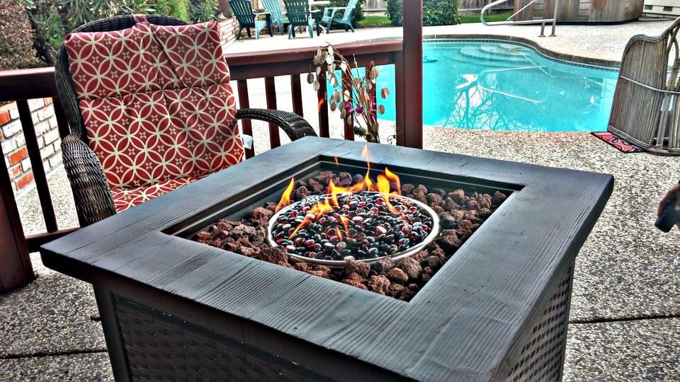 Gas-Powered Fire Pit inside Gazebo in Backyard