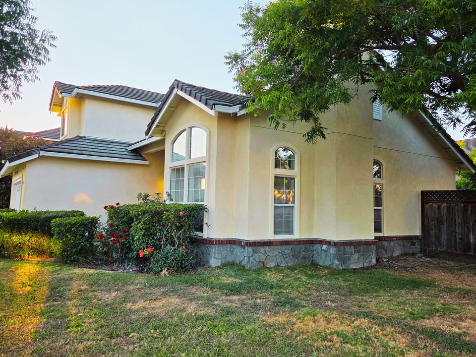 Brand new stucco siding - side view.