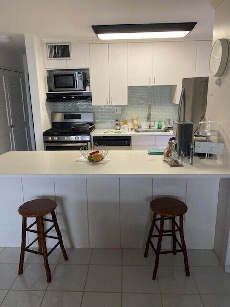 Kitchen, stainless double door fridge microwave, dishwasher, 5 burner gas stove.