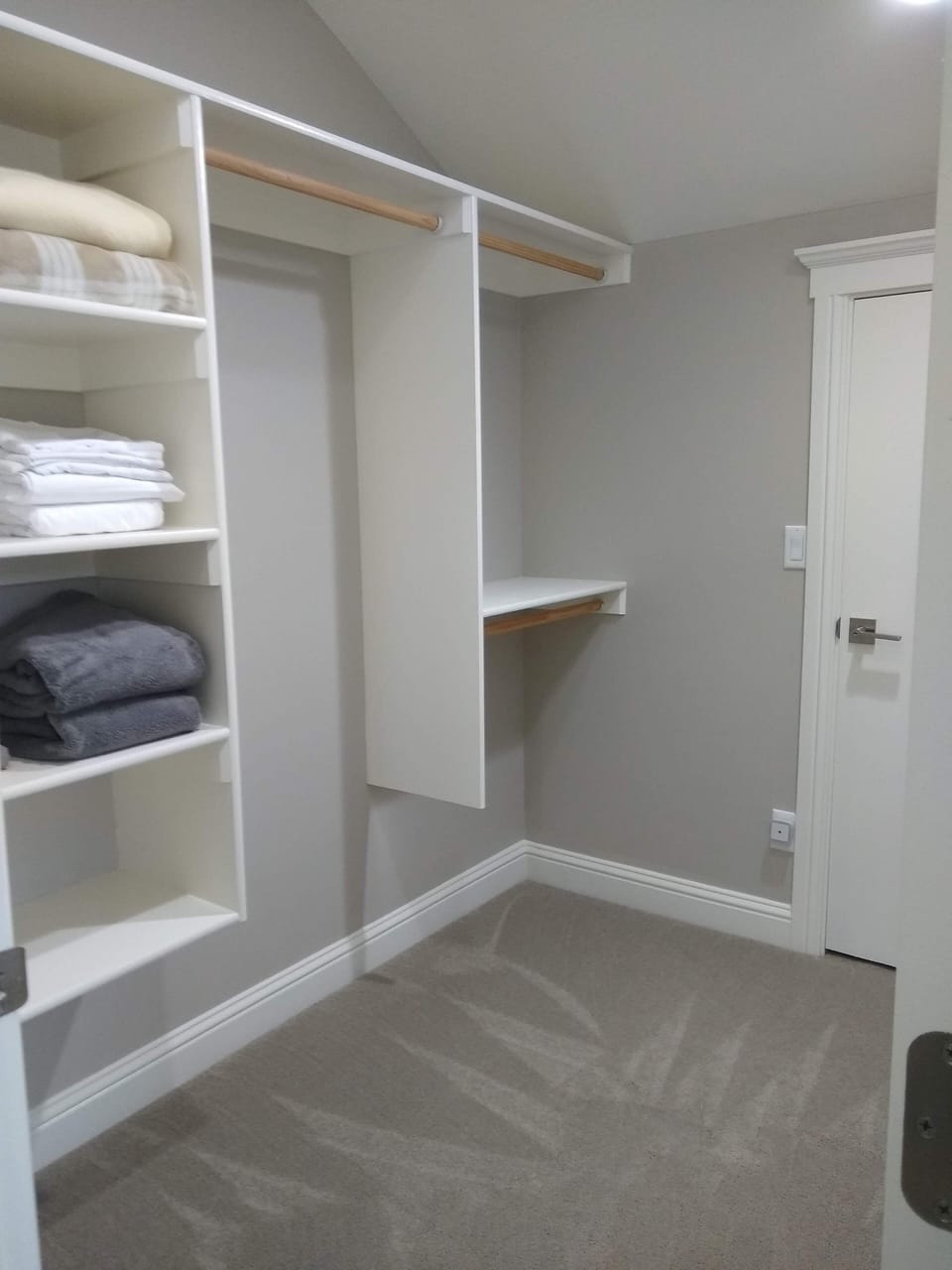 Walk in closet attached to the king bedroom.