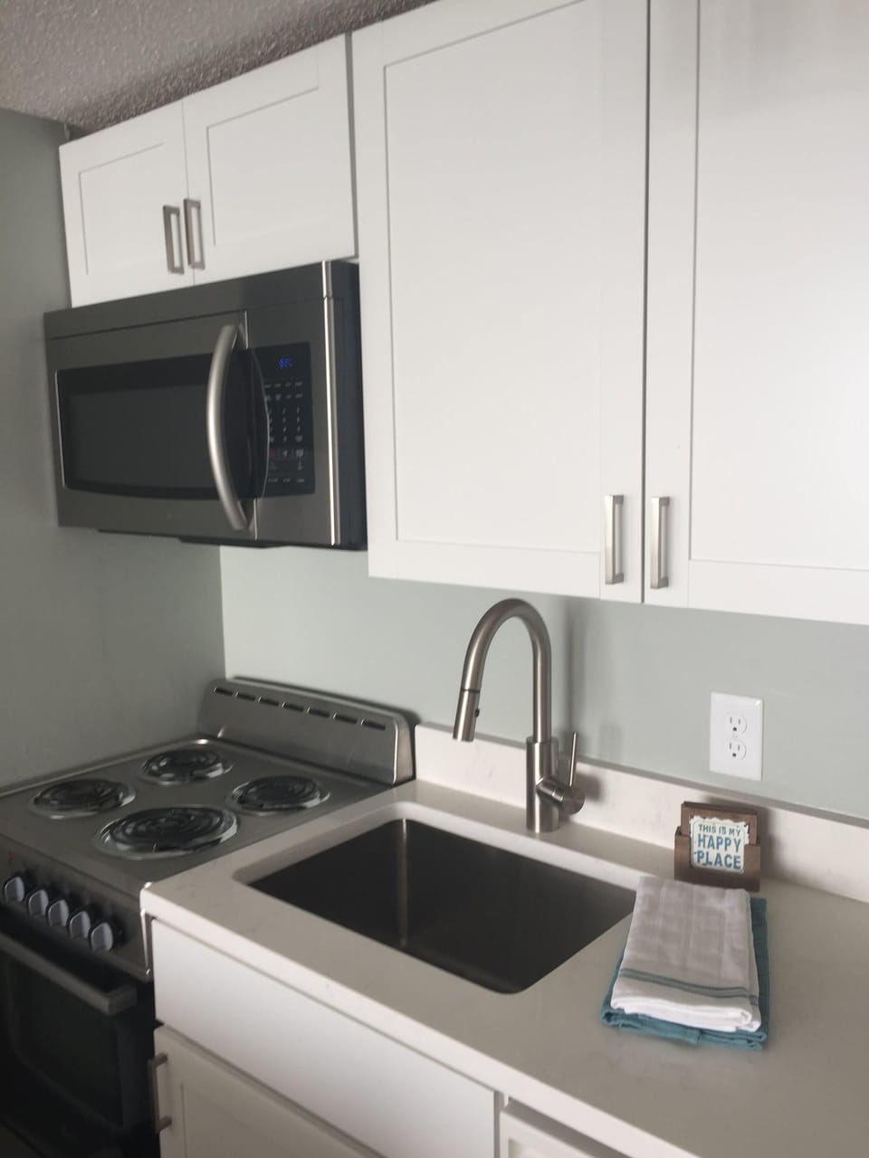 new stainless range, microwave and sink!