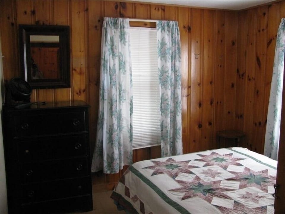 One of the four bedrooms.