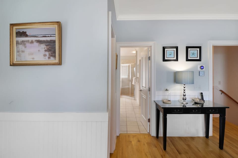 Primary king bedroom leading into private bathroom