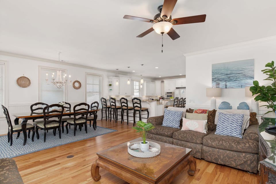 Living room with Dining room and bar area seating