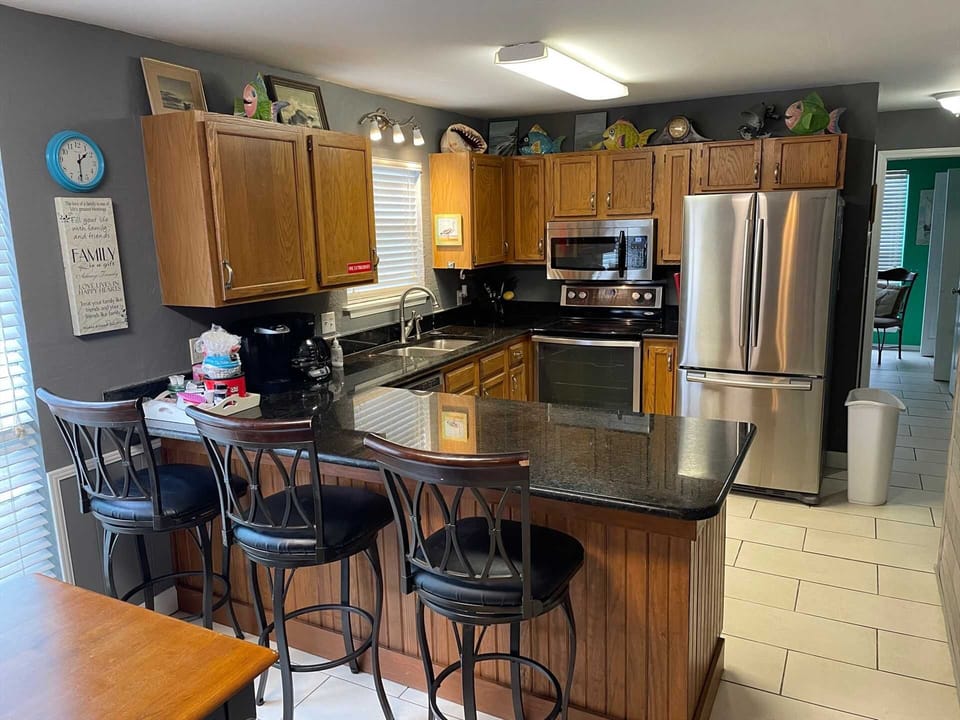 Another view of kitchen w/Stainless appliances