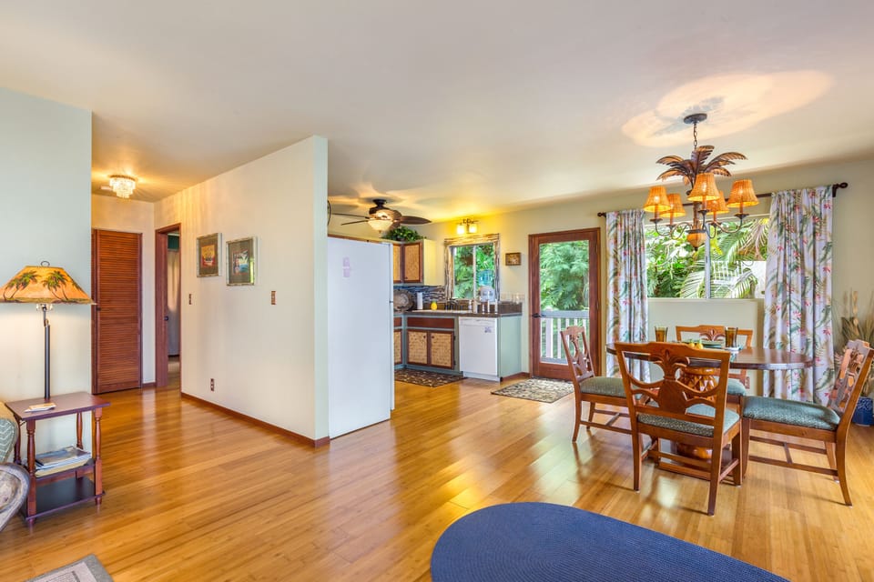 brighter view of kitchen and dining area and door to connecting lanai 