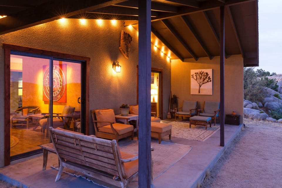 Back porch off the living room and master bedroom.  Great place to catch sunris