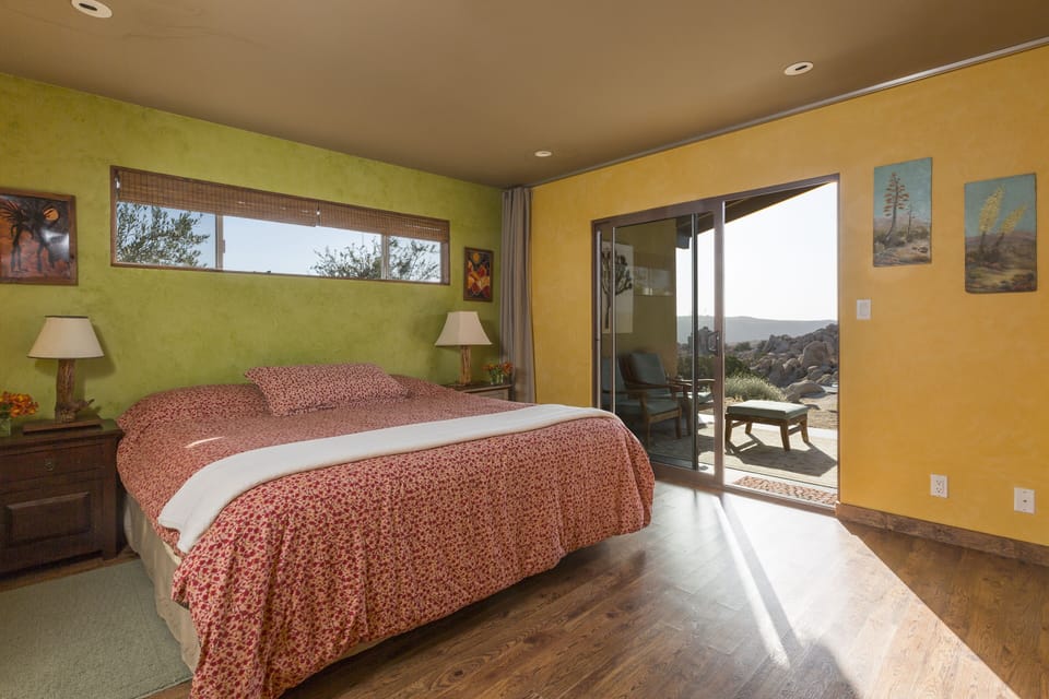 Bedroom #1, with King Bed and bathroom - and great morning views.
