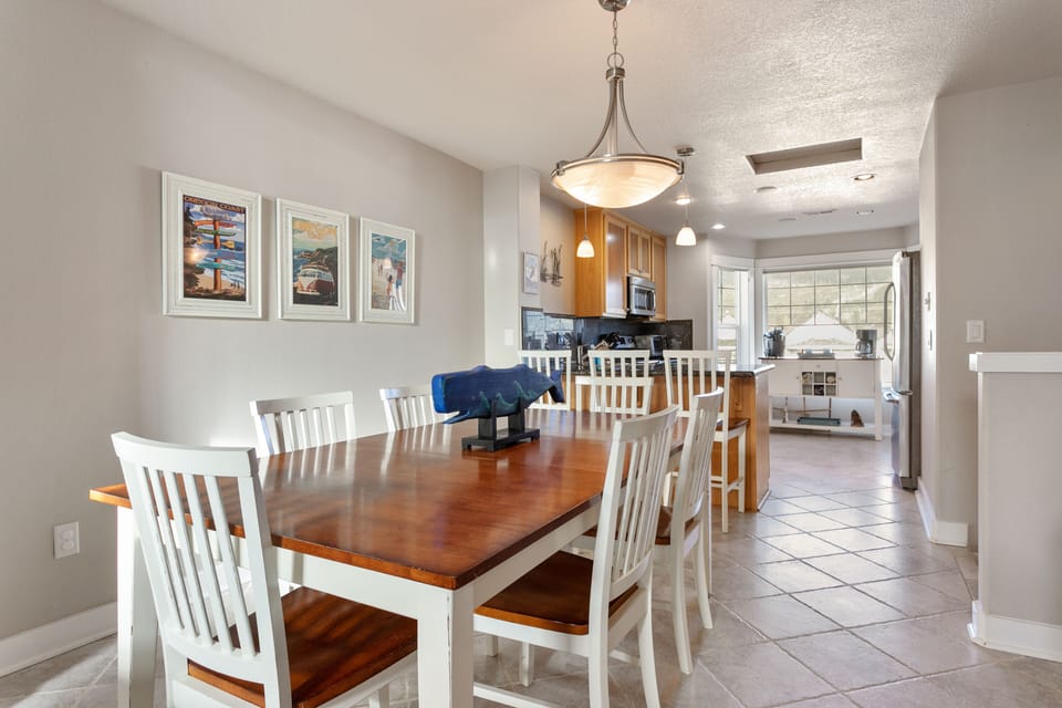 Dining Area for six at the table and additional three at the bar seats.
