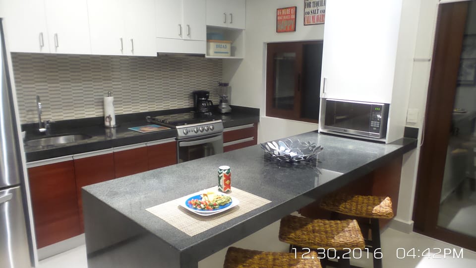 Kitchen is fully equipped with good quality appliances, dishes, pots. etc.