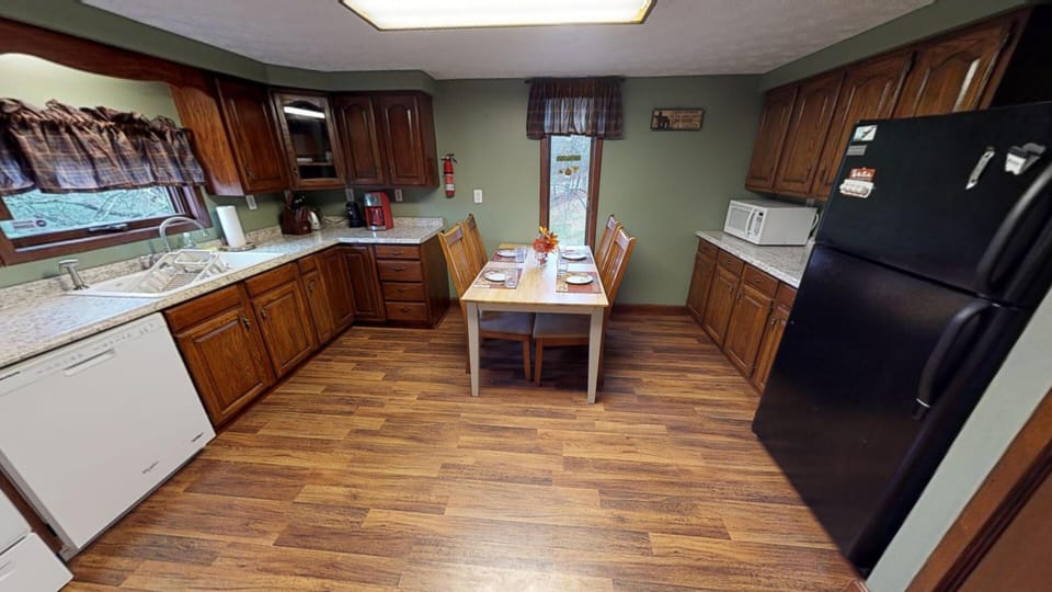 Kitchen comes equipped with all the amenities you need for a getaway!