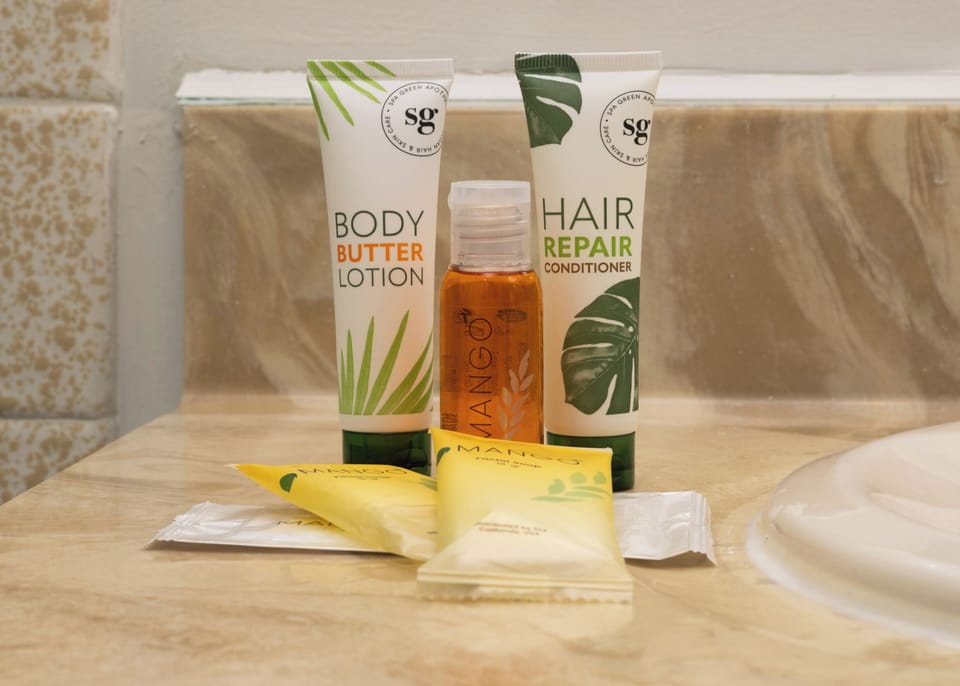 Room, 1 Queen Bed, Roll-in Shower | Bathroom amenities | Shower, free toiletries, hair dryer, towels