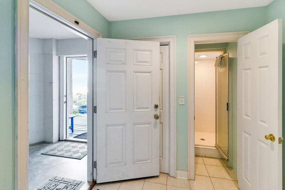 Bottom level leading to the garage- shower to rinse off after the beach