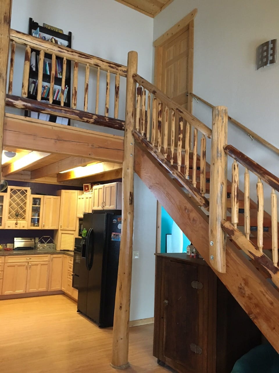 Stairway to getting away from it all-to the loft or master suite.