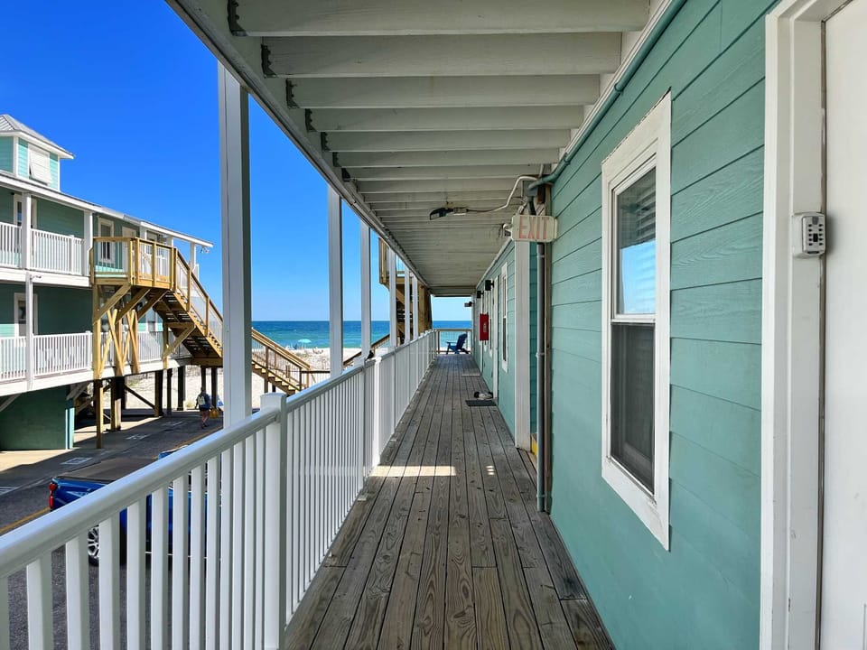 View from breezeway by the entrance of 104. Breezeway leads right to the beach, just steps from your door!