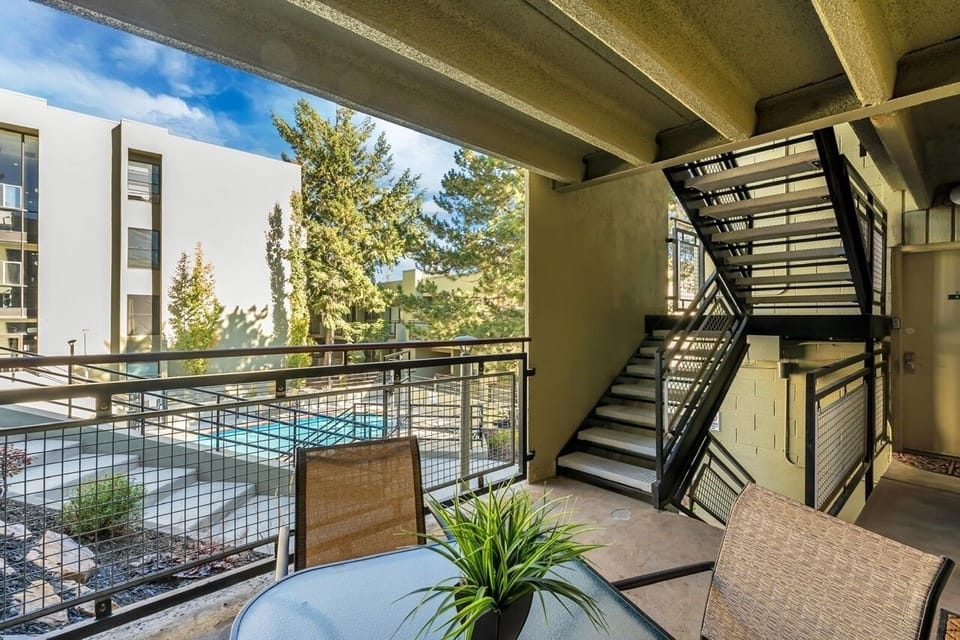 View from sliding glass door to Edelweiss pool. 