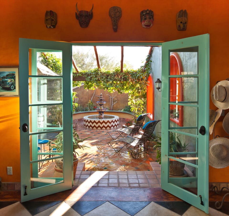 Doors to courtyard with fountain
