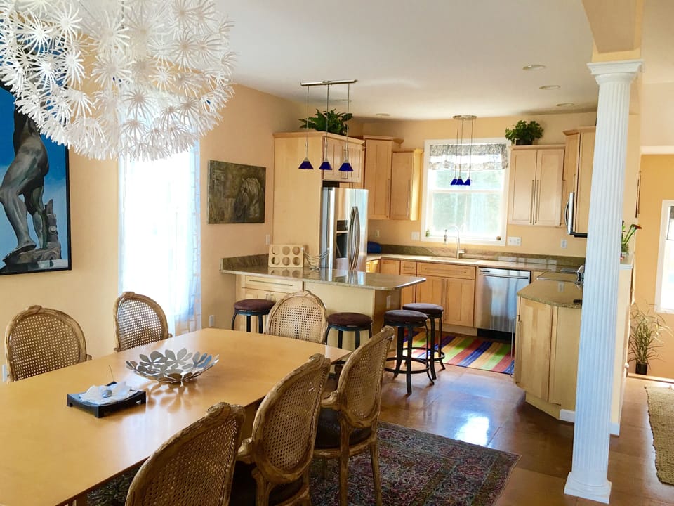 Gourmet kitchen with top of the line stainless steel appliances, granite counter