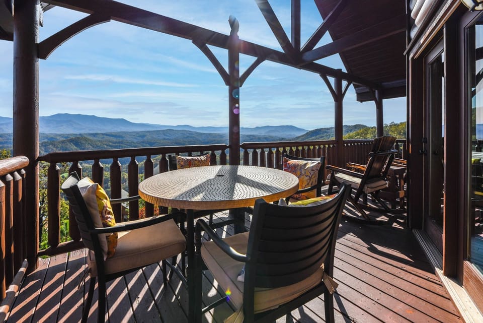 - Step onto the deck and enjoy panoramic Smoky Mountain views stretching for miles   - Relax with morning coffee or evening wine in this open-air mountain retreat   - Comfortable outdoor seating makes every sunrise and sunset a memorable moment