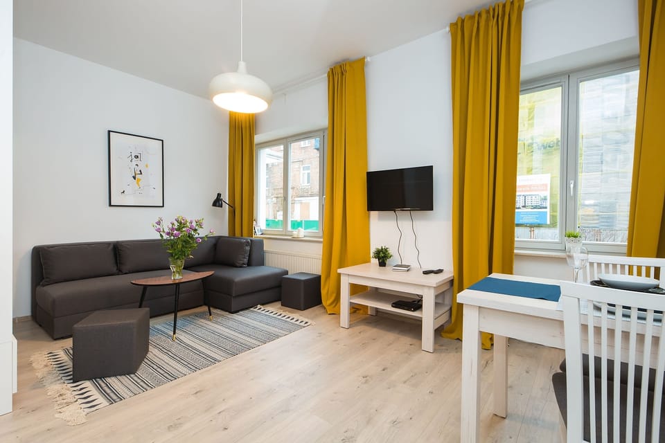 Apartment, Non Smoking | Living area | Flat-screen TV