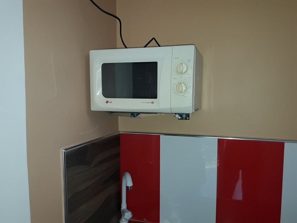 Shared fridge, microwave, rice cooker, cookware/dishes/utensils